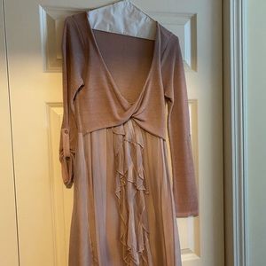 Long sleeved wrap top dress with silk swingy bottom. Mauve color.